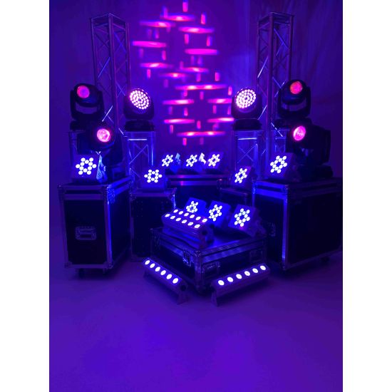 Uplighting setup with truss towers, moving lights, and LED fixtures on road cases, event stage lighting package for weddings and dance floors.