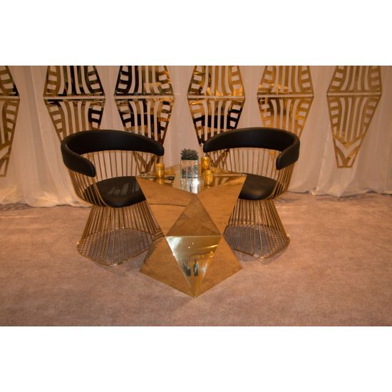 Gold laser-cut wall panel with repeating art deco geometric pattern, luxe event backdrop wall for weddings, stages, and photo ops.