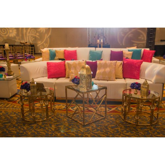 Silver stainless-steel Reflection Web coffee table with open lattice web-style base and sleek top, designed for modern event lounge décor