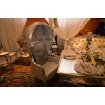 Black Empress dome armchair with tall canopy-style back and smooth upholstery, dramatic lounge chair rental for weddings and events.