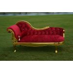 Monarch chaise lounge in red tufted upholstery with ornate gold frame and curved design, elegant chaise rental for weddings and events.