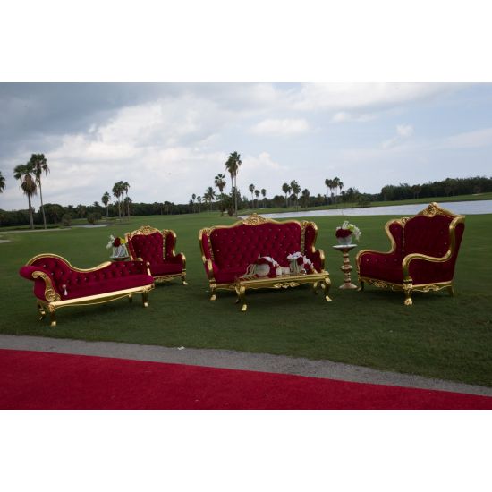 Monarch chaise lounge in red tufted upholstery with ornate gold frame and curved design, elegant chaise rental for weddings and events.