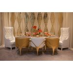 Gold laser-cut wall panel with repeating art deco geometric pattern, luxe event backdrop wall for weddings, stages, and photo ops.