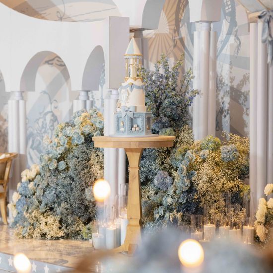 white bohemian-style high-boy cocktail table with black round top for event rental