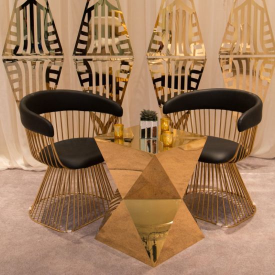 Gold stainless-steel Reflection abstract side table with sculptural geometric base and sleek minimalist top, ideal for modern event lounge décor