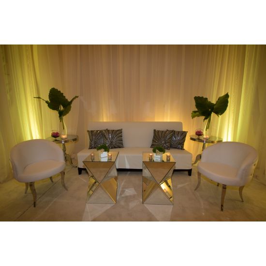 Gold stainless-steel Reflection abstract side table with sculptural geometric base and sleek minimalist top, ideal for modern event lounge décor