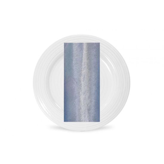 Dusty blue velvet napkin with plush texture and soft sheen, folded on a white plate for romantic weddings and refined event tables