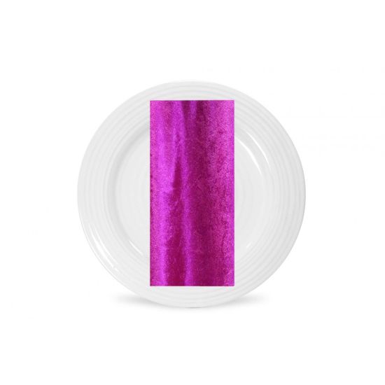 Magenta velvet napkin with plush texture and vibrant jewel-tone sheen, folded on a white plate for bold weddings and event table décor