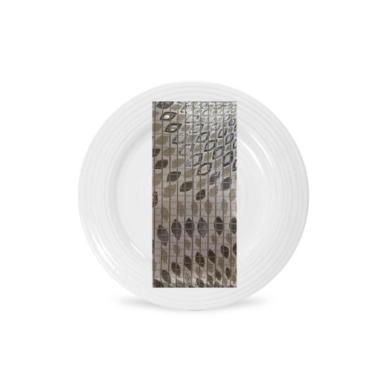 Silver whirl napkin with metallic circular swirl pattern and textured finish, folded on a white plate for sleek formal event décor